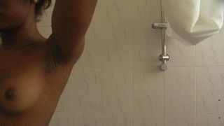 Teeny black going wild in the shower 777sex